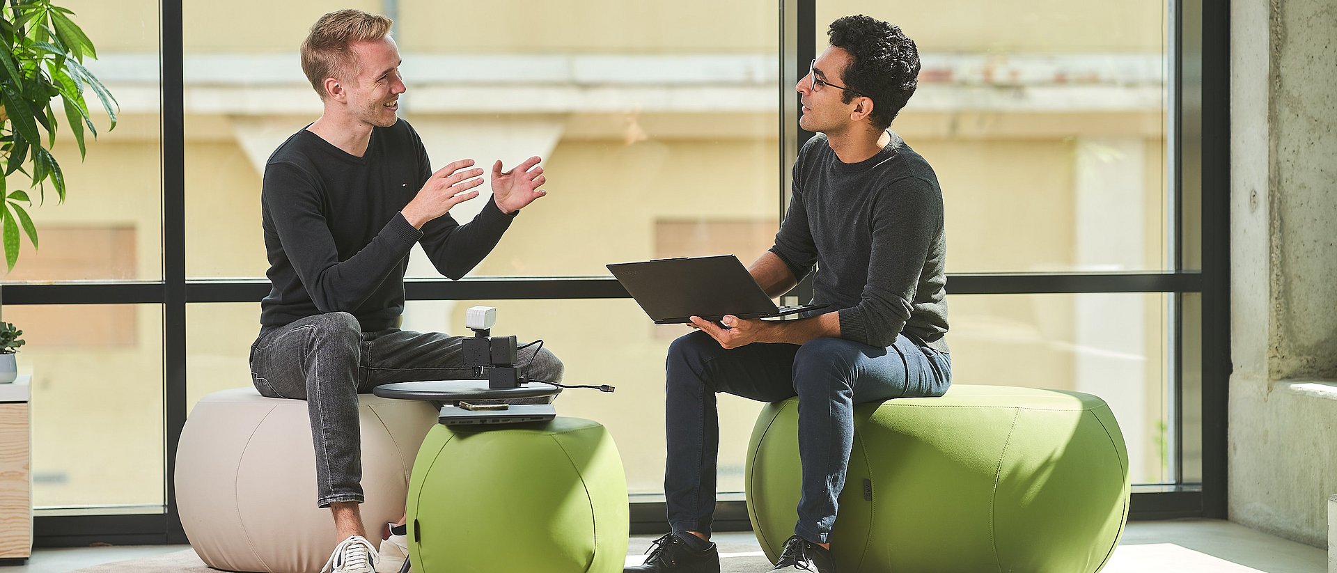 Members of a founding team in conversation.