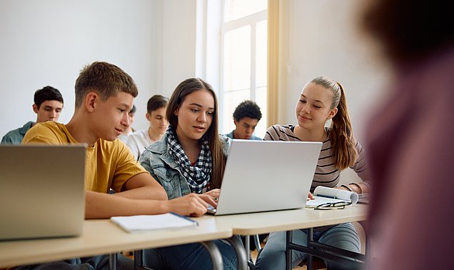 Teens with a laptop